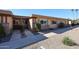 Charming exterior view of a well-maintained home with a cozy front porch at 13861 N 111Th Ave, Sun City, AZ 85351