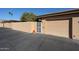 Charming townhome showcasing a well-maintained exterior, a garage and gated entry at 13861 N 111Th Ave, Sun City, AZ 85351