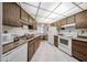 Functional kitchen with great counter space and tile flooring at 13861 N 111Th Ave, Sun City, AZ 85351