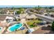 Expansive aerial view highlighting the home's private pool, spacious backyard, and outdoor entertainment area at 16302 N 36Th Ave, Phoenix, AZ 85053