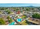 Expansive aerial view of the property showcasing its inviting pool, manicured backyard, and neighborhood setting at 16302 N 36Th Ave, Phoenix, AZ 85053