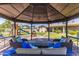 Relaxing backyard gazebo with comfortable seating overlooking the landscaped yard, perfect for outdoor enjoyment at 16302 N 36Th Ave, Phoenix, AZ 85053