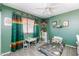 bedroom featuring natural light, a ceiling fan, and an adventure themed décor at 16302 N 36Th Ave, Phoenix, AZ 85053