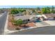 Well-kept single-story home featuring mature landscaping and a welcoming driveway at 16302 N 36Th Ave, Phoenix, AZ 85053