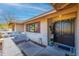 Inviting front entrance features double doors, neutral brick, and seating area, plus a 'Welcome' mat at 16302 N 36Th Ave, Phoenix, AZ 85053