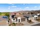 Single-story home with solar panels and mountain views in a residential community at 19063 N 265Th Ave, Buckeye, AZ 85396