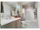 Main bathroom with a bathtub, shower, and neutral color scheme at 19063 N 265Th Ave, Buckeye, AZ 85396