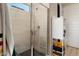 Clean bathroom with a walk-in shower, stylish tile, and ample storage at 19063 N 265Th Ave, Buckeye, AZ 85396