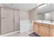 Bathroom with double vanity, tub, and shower at 19700 N 76Th St # 1112, Scottsdale, AZ 85255