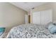 Bedroom with a queen-size bed and closet at 19700 N 76Th St # 1112, Scottsdale, AZ 85255