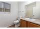 Clean bathroom with toilet, sink, and vanity at 201 2Nd E Ave, Buckeye, AZ 85326