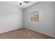 Simple bedroom with ceiling fan and neutral walls at 201 2Nd E Ave, Buckeye, AZ 85326