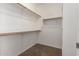 Large walk-in closet with shelving and hanging rods at 201 2Nd E Ave, Buckeye, AZ 85326