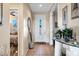 Elegant entryway with tile floors and a view of a bedroom and living area at 20208 N Oxbow Ln, Maricopa, AZ 85138