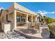 Outdoor patio featuring a built-in grill and dining area at 20208 N Oxbow Ln, Maricopa, AZ 85138