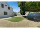 Backyard with rock landscaping and green putting green, perfect for outdoor enjoyment at 2105 N Kachina --, Mesa, AZ 85203