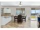 Bright kitchen with eat in table, tiled floor, stainless appliances and backyard access at 2105 N Kachina --, Mesa, AZ 85203