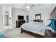 A main bedroom featuring light colored carpet, and a ceiling fan at 2105 N Kachina --, Mesa, AZ 85203