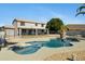 Fenced in Pool with a boulder accented garden at 2105 N Kachina --, Mesa, AZ 85203