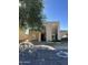 Front view of two-story home with arched entryway and desert landscaping at 2125 E Dunbar Dr, Tempe, AZ 85282