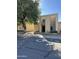 Two-story stucco home with arched entryway and mature tree at 2125 E Dunbar Dr, Tempe, AZ 85282