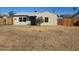 Cozy single-story home with a neutral-toned exterior and a well-kept front yard at 2324 W Luke Ave, Phoenix, AZ 85015