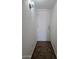 Hallway with exterior door and dark tile floors at 2324 W Luke Ave, Phoenix, AZ 85015