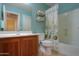 Clean bathroom with a shower/tub combo and wood vanity at 2409 E Antigua Dr, Casa Grande, AZ 85194