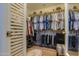 Large walk-in closet with ample shelving and hanging space at 2409 E Antigua Dr, Casa Grande, AZ 85194