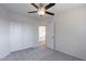 Bedroom with ceiling fan and double door closet at 2438 W Gambit Trl, Phoenix, AZ 85085