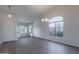 Bright living room with hardwood floors and large windows at 2438 W Gambit Trl, Phoenix, AZ 85085