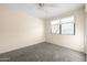 Well-lit bedroom with carpet and window coverings at 2715 S Rita Ln, Tempe, AZ 85282