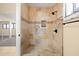 Updated shower with tile surround and modern fixtures at 2715 S Rita Ln, Tempe, AZ 85282