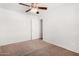 Bedroom with carpet flooring, neutral paint and a ceiling fan at 2906 W Alice Ave, Phoenix, AZ 85051