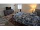 Bedroom with full bed, dresser, and rug, featuring neutral decor at 3014 N Majestic Ct, Casa Grande, AZ 85122