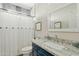 Bathroom featuring a vanity sink and a shower with a white shower curtain at 3021 E Agritopia N Loop, Gilbert, AZ 85296