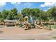 Community playground features slides, climbing frames, and picnic area for residents to enjoy at 3021 E Agritopia N Loop, Gilbert, AZ 85296