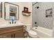 Small bathroom with patterned tile and bathtub at 30416 N 64Th St, Cave Creek, AZ 85331