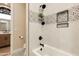 Bathroom with patterned tile and bathtub at 30416 N 64Th St, Cave Creek, AZ 85331