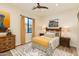 Cozy bedroom with rustic wooden bed frame at 30416 N 64Th St, Cave Creek, AZ 85331