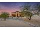 Stunning desert home exterior at sunset at 30416 N 64Th St, Cave Creek, AZ 85331