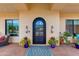 Close up of the home's beautiful front door at 30416 N 64Th St, Cave Creek, AZ 85331