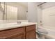 Clean bathroom with a bathtub, toilet, and vanity at 31292 N Candlewood Dr, San Tan Valley, AZ 85143