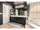 Bathroom boasts double vanity and soaking tub at 31292 N Candlewood Dr, San Tan Valley, AZ 85143