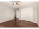 Bedroom with double door closet and wood floors at 31292 N Candlewood Dr, San Tan Valley, AZ 85143