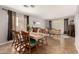 Bright dining room with a table and view of living room at 31292 N Candlewood Dr, San Tan Valley, AZ 85143