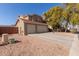 Two-story house with a two-car garage and a side yard at 31292 N Candlewood Dr, San Tan Valley, AZ 85143