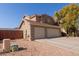 Two-story house with a two-car garage and a side yard at 31292 N Candlewood Dr, San Tan Valley, AZ 85143