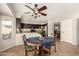 Kitchen with breakfast nook and dark brown cabinetry at 31292 N Candlewood Dr, San Tan Valley, AZ 85143