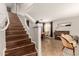 Wooden staircase leading to the upper level of the home at 31292 N Candlewood Dr, San Tan Valley, AZ 85143